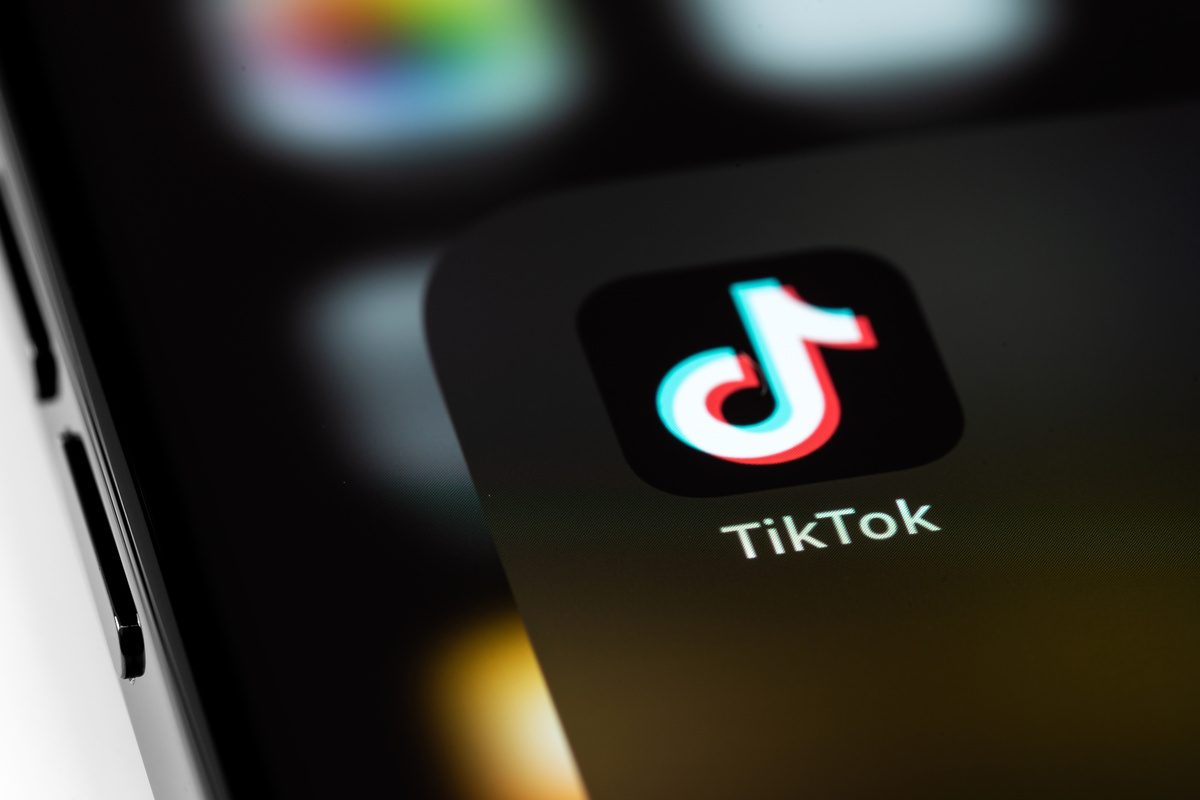 TikTok mobile icon app on screen smartphone iPhone macro. TikTok is app to create and share videos. Moscow, Russia – June 15, 2021