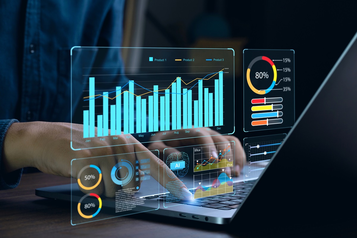 Businessman works on laptop Showing business analytics dashboard