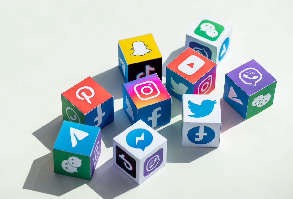 Kyiv, Ukraine – September 5, 2019: A paper cubes collection with printed logos of world-famous social networks and online messengers, such as Facebook, Instagram, YouTube, Telegram and others.